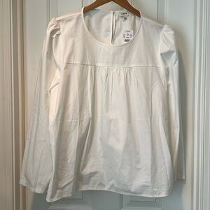 J. Crew women’s white cotton blouse with puff sleeve accent.